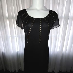 Editions black dress with gold studs.